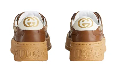Gucci Textured Leather Sneakers With Branded Chunky Outsole In Brown