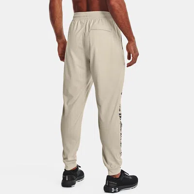 Under Armour Sportstyle Tricot Graphic Pants 'beige' In Neutral