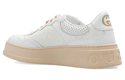 Gucci Gg Embossed Low-top Sneakers In White