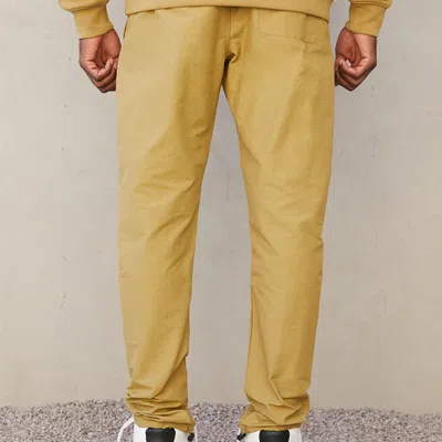 Essentials Fear Of God  Fw21 Track Pant 'amber' In Neutral