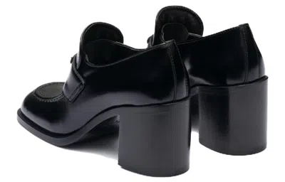 Prada Chocolate High-heeled Brushed Leather Loafers In Black