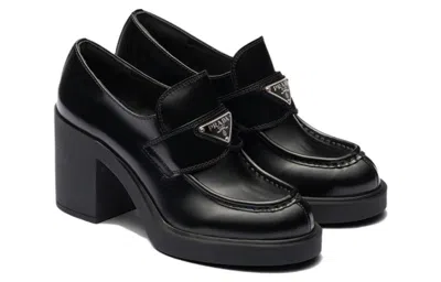 Prada Chocolate High-heeled Brushed Leather Loafers In Black