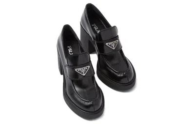 Prada Chocolate High-heeled Brushed Leather Loafers In Black