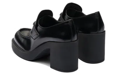 Prada Chocolate High-heeled Brushed Leather Loafers In Black