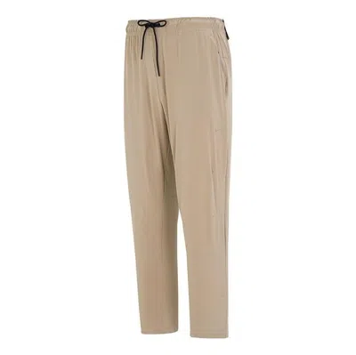 Nike Sportswear Pants 'khaki' In Brown