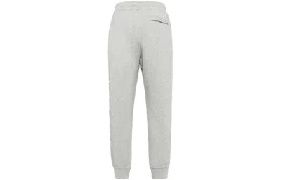 Nike Sportswear Swoosh Logo Slim Fit Bundle Feet Sports Long Pants Gray