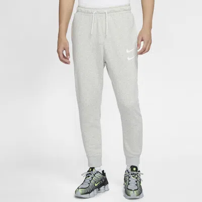Nike Sportswear Swoosh Logo Slim Fit Bundle Feet Sports Long Pants Gray