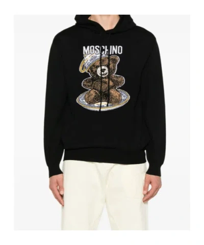 Moschino Wool Sweaters In Black
