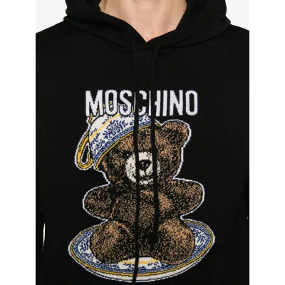 Moschino Wool Sweaters In Black