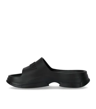 Ganni Logo-embossed Chunky Slides In Black