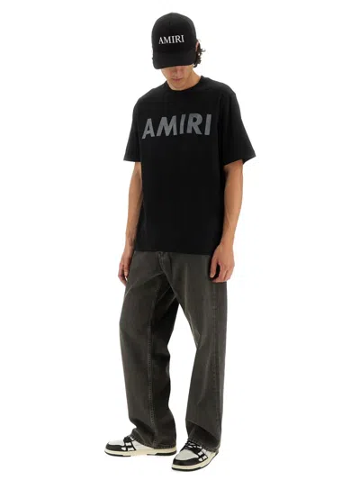 Amiri Logoed T-shirt In Black