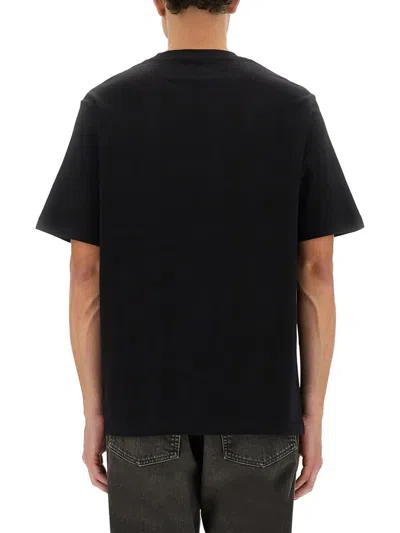 Amiri Logoed T-shirt In Black