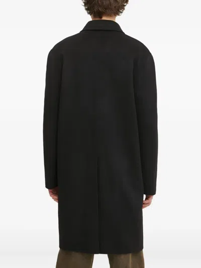 Nanushka Button-fastening Pocket Coat In Black