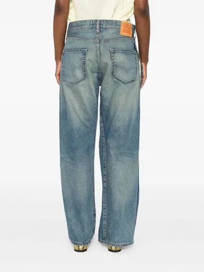 Comme Des Garçons Asymmetric-hem Jeans In Blue