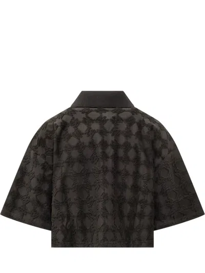 Amiri Ma Quad Textured-pattern Polo Shirt In Black