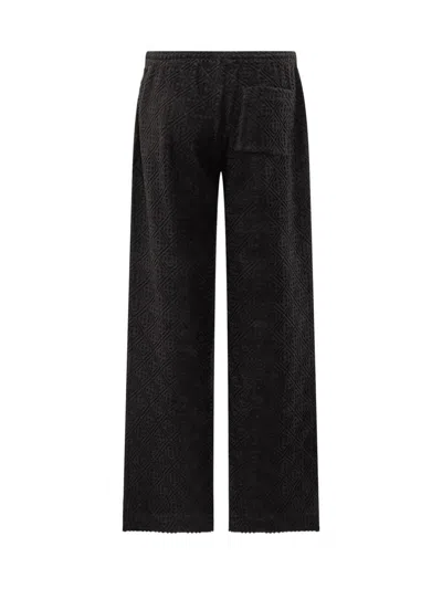 Casablanca Textured-panel Towelling Trousers In Black