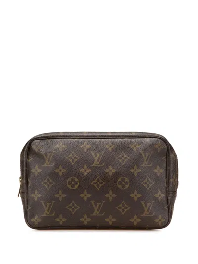 Pre-owned Louis Vuitton 20th Century Monogram Trousse Toilette 23 Clutch Bag