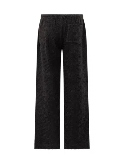 Casablanca Textured-panel Towelling Trousers In Black