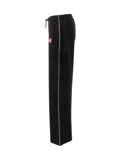 Casablanca Textured-panel Towelling Trousers In Black