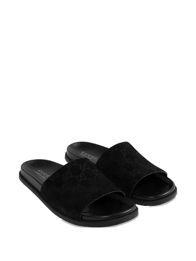 Gucci Men Leather Slides With All-over Gg Motif In Black