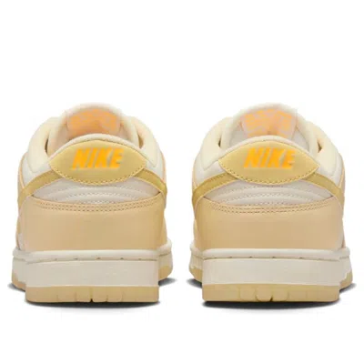 Nike Dunk Low Sneaker In Gold