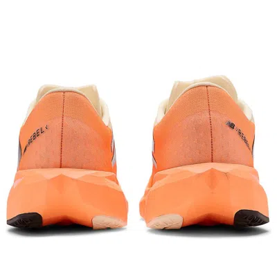 New Balance Men Rebel V4 Shoes In Orange Biege In Multi