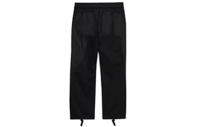 Nike Black Logo-printed Functional Pants In Black