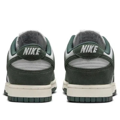 Nike Women's Dunk Low Sneaker In White/pro Green/coconut Milk In Multi