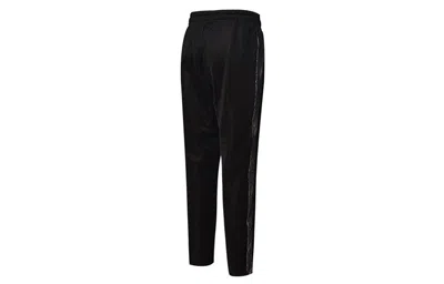 Puma (wmns)  Nuluxe Track Pants In Black