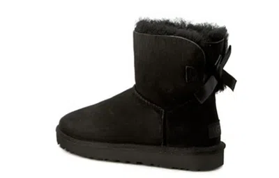 Ugg (wmns)  Mini Bailey Bow Ii Classic Fleece Lined Black In Brown