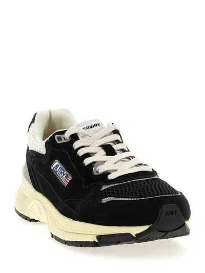 Autry Hyperway Black Low Top Sneakers With Logo Patch On Tongue And Side In Tech Fabric Man