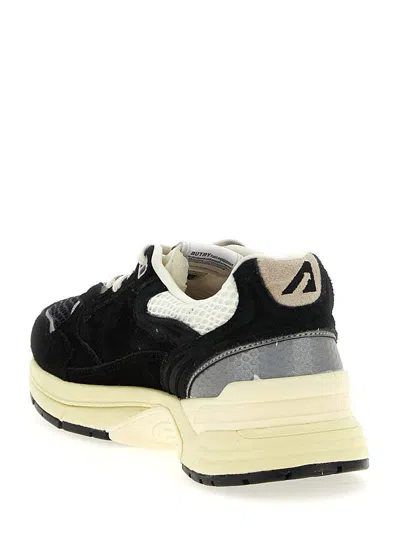 Autry Hyperway Black Low Top Sneakers With Logo Patch On Tongue And Side In Tech Fabric Man