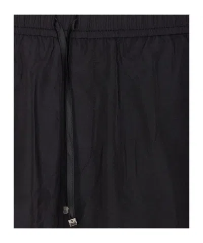Amiri Elasticized Waist Knee Length Shorts With Print In Black