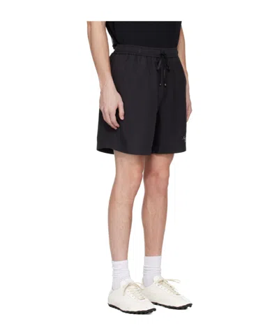 Amiri Elasticized Waist Knee Length Shorts With Print In Black