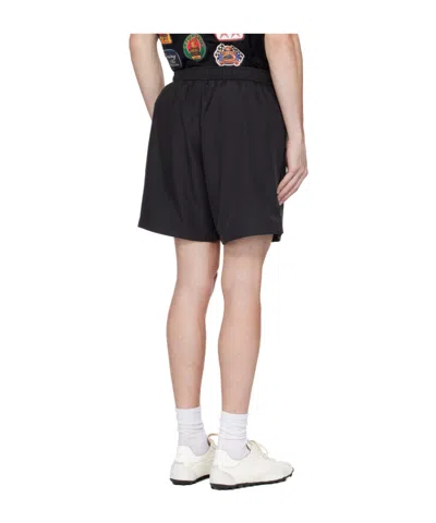 Amiri Elasticized Waist Knee Length Shorts With Print In Black