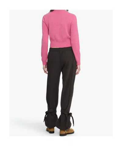 Jw Anderson Tie-fastening Cuffed Trousers In Brown