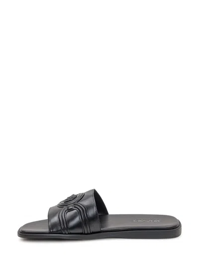 Versace Round Toe Slippers In Black