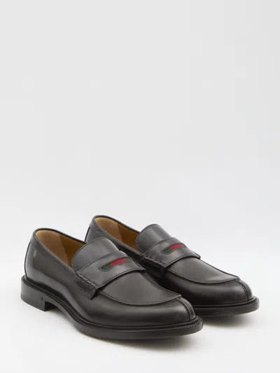 Gucci Web-stripe Leather Loafers In Black