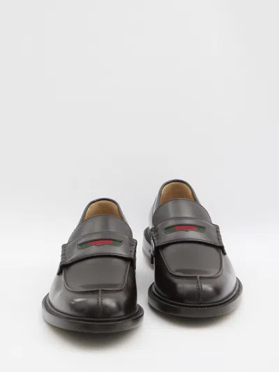 Gucci Web-stripe Leather Loafers In Black