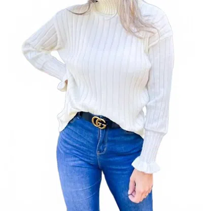 Amoli Ruffle Sleeve Turtleneck Sweater In Cream