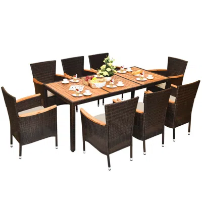 Hivvago 9 Pieces Rattan Dining Set With Acacia Wood Table And Stackable Cushioned Chairs In Brown