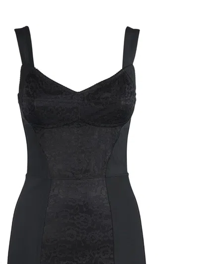 Dolce & Gabbana A Dress With A Girdle And Breast. In Black