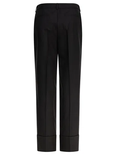 Valentino Garavani Trousers In Black
