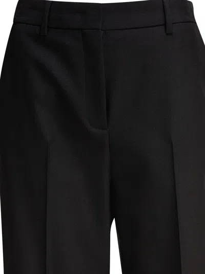 Valentino Garavani Trousers In Black