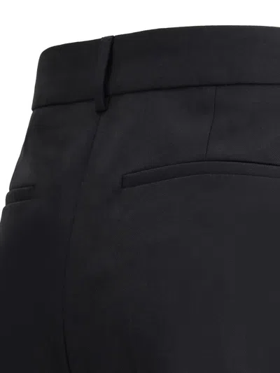 Valentino Garavani Trousers In Black
