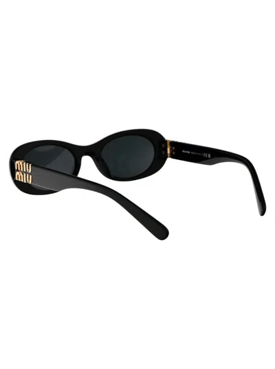Miu Miu Logo-lettering Oval-frame Sunglasses In Black