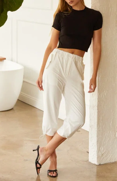 Crescent Tie Back Knit Top In Black