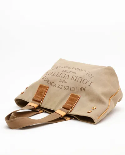 Pre-owned Louis Vuitton Denim Articles De Voyage Mm Tote Bag