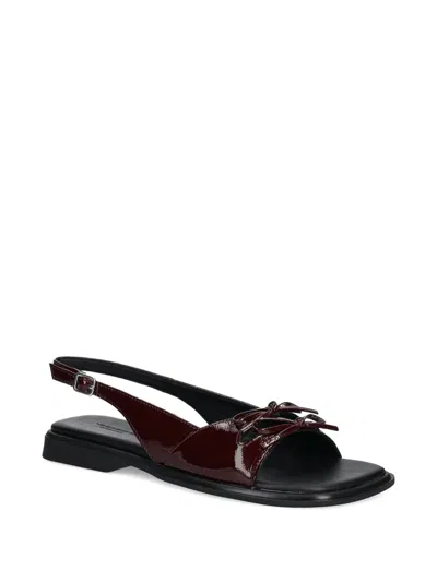 Vagabond Izzy Patent Bow Slingback Sandals In Brown