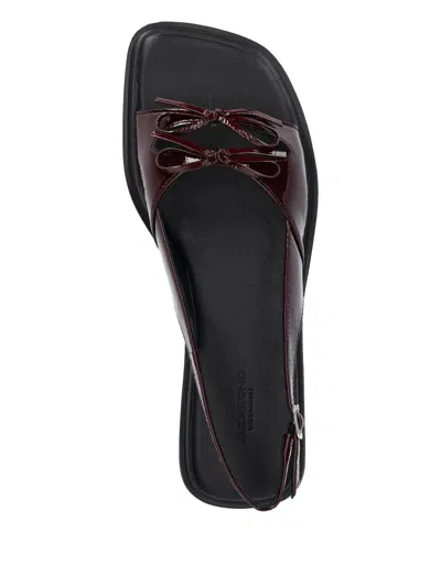 Vagabond Izzy Patent Bow Slingback Sandals In Brown